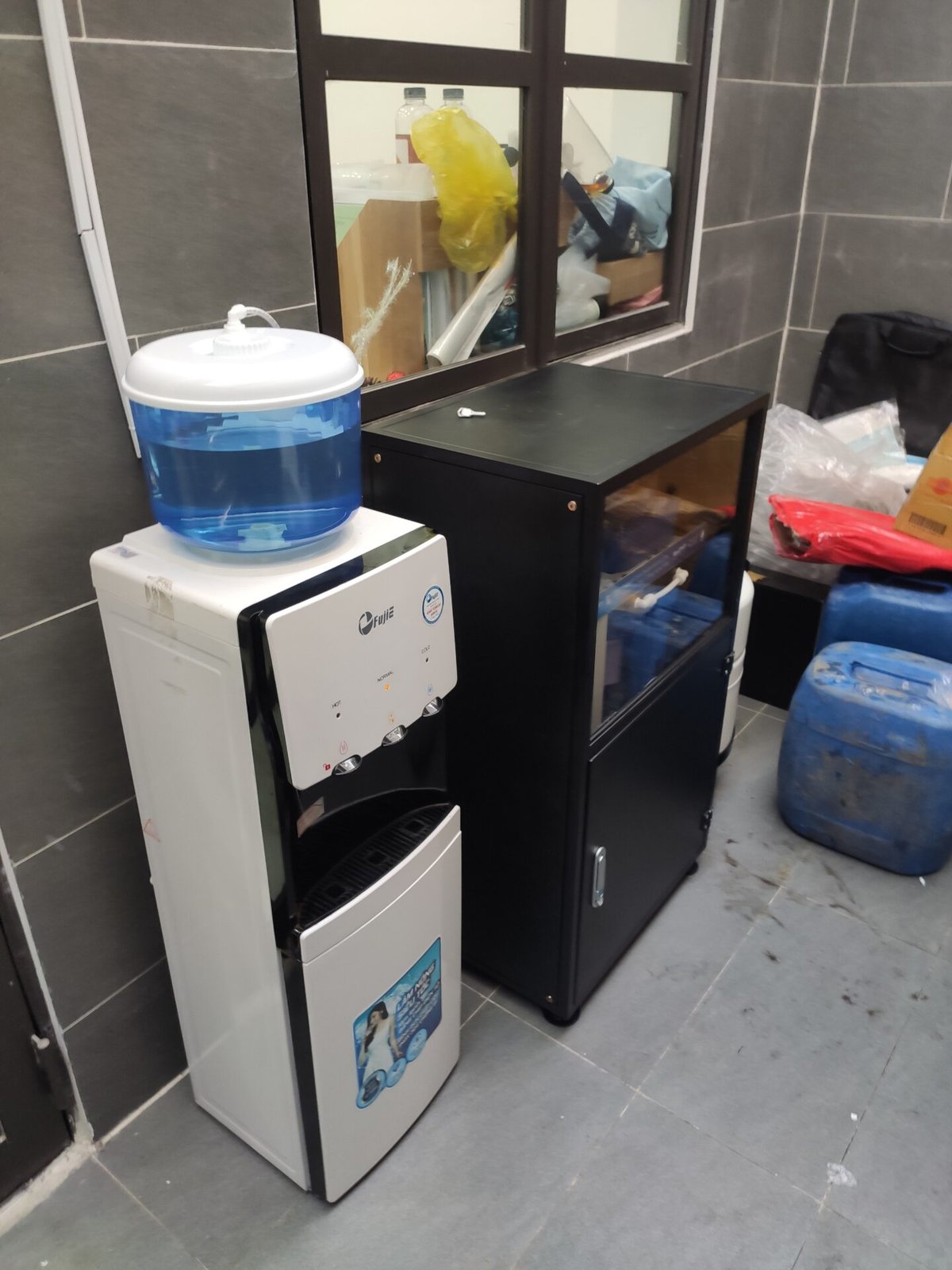 Máy lọc kèm cây nóng lạnh Công ty Anh Vũ